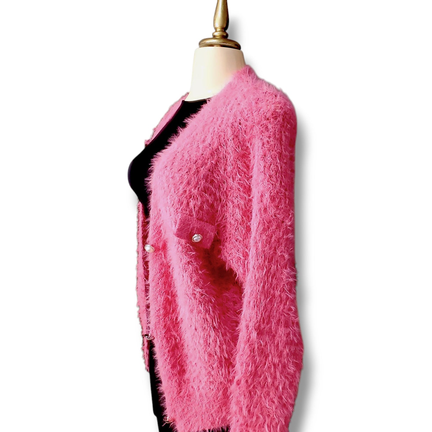 Suéter cárdigan de peluche con botones frontales