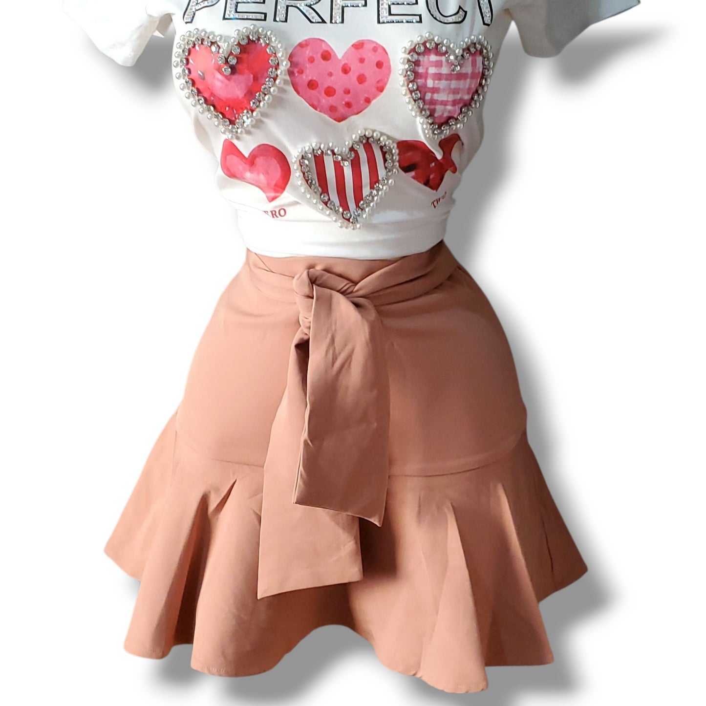 Falda con volantes y short incluido con lazo ajustable