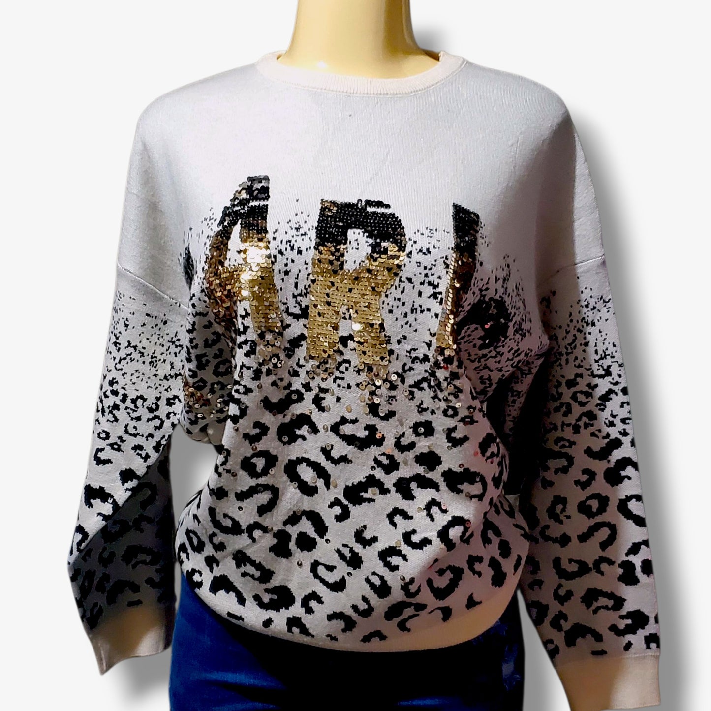 Suéter holgado de punto con estampado de leopardo y lentejuelas