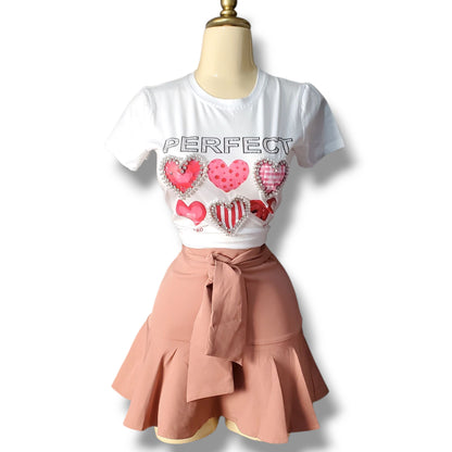 Falda con volantes y short incluido con lazo ajustable