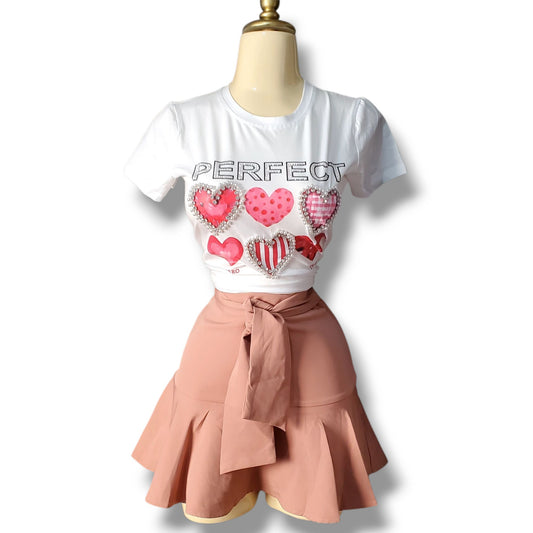 Falda con volantes y short incluido con lazo ajustable