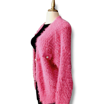 Suéter cárdigan de peluche con botones frontales