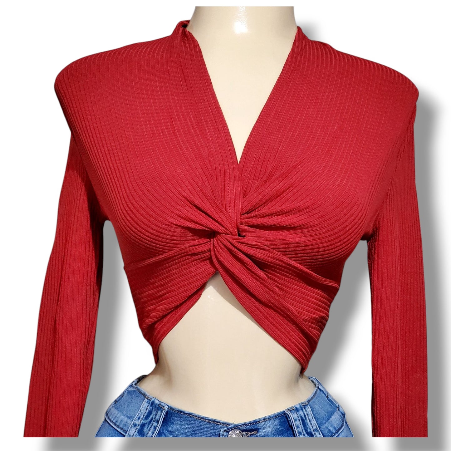 Blusa corta de manga larga con nudo frontal