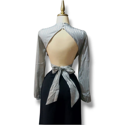 Blusa de manga larga abullonada con escote en espalda y lazo en cintura